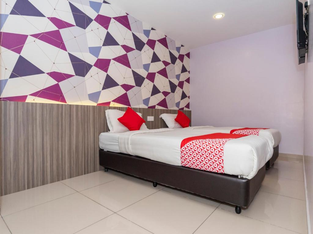 Postel nebo postele na pokoji v ubytování MK Paradise hotel