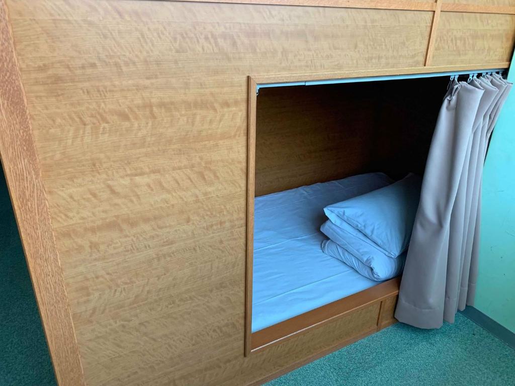 Postel nebo postele na pokoji v ubytování Ace Inn Shinjuku