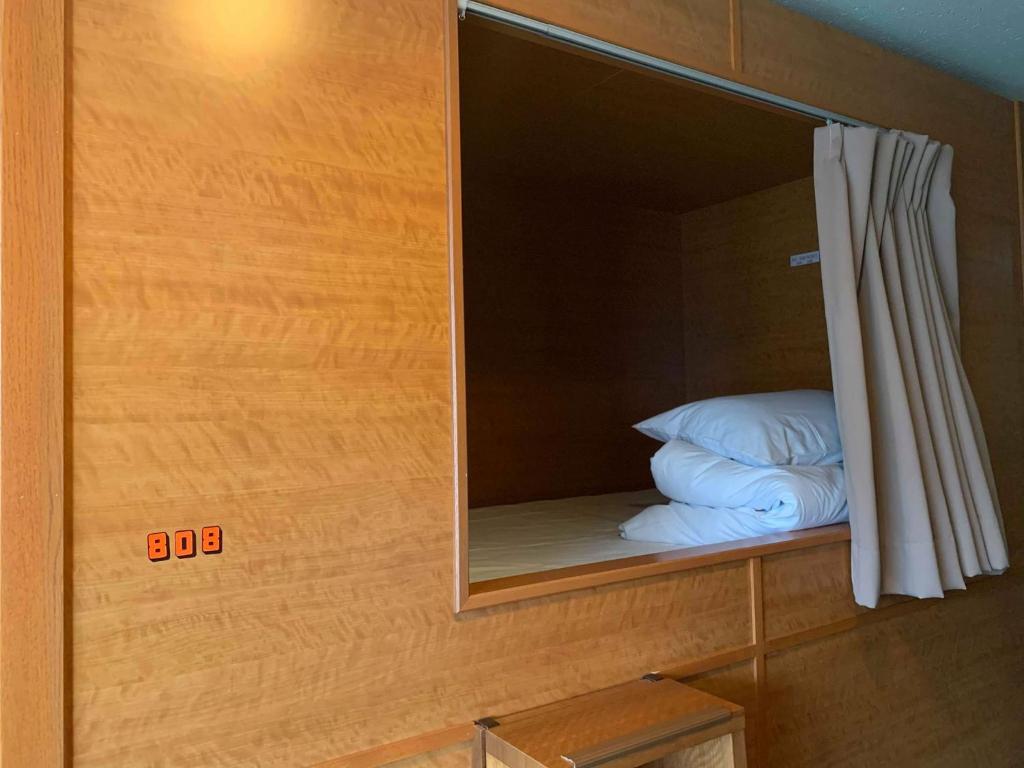 Postel nebo postele na pokoji v ubytování Ace Inn Shinjuku