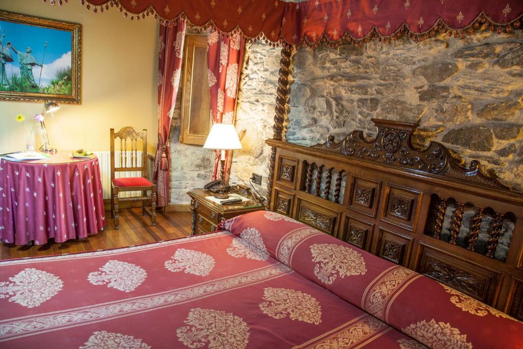 Postel nebo postele na pokoji v ubytování Pazo Xan Xordo