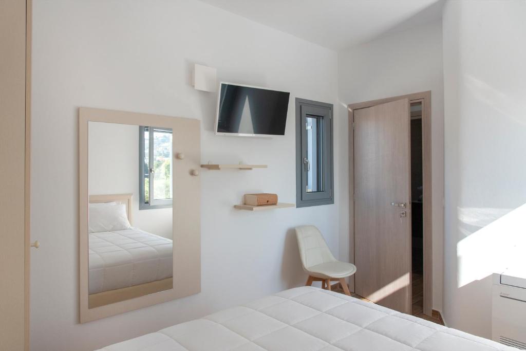 Posteľ alebo postele v izbe v ubytovaní PAROS ELITAS VILLAS