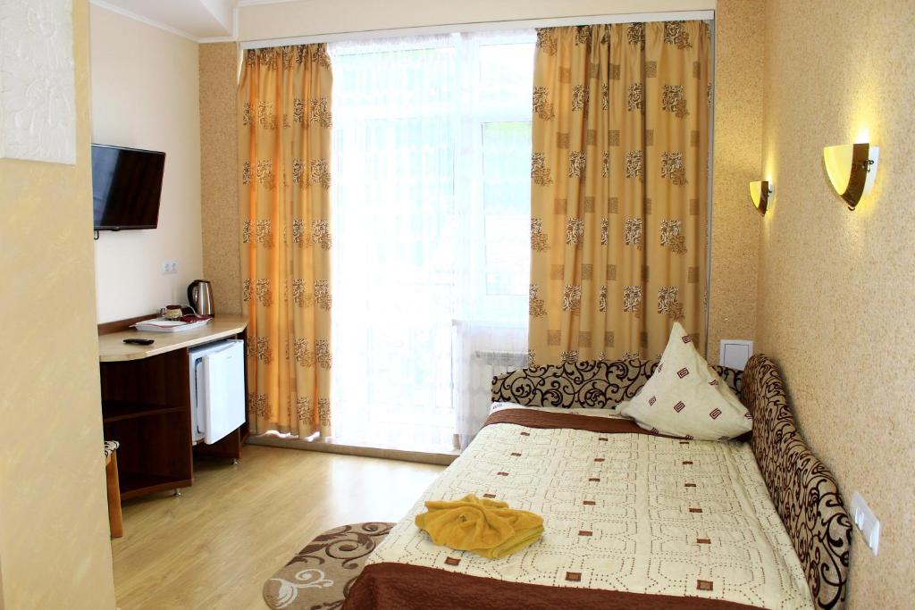 Postel nebo postele na pokoji v ubytování Kvasova Voda