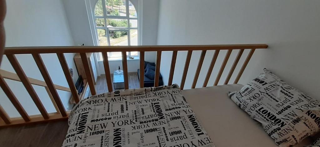Postel nebo postele na pokoji v ubytování Apartmány Vila Singles