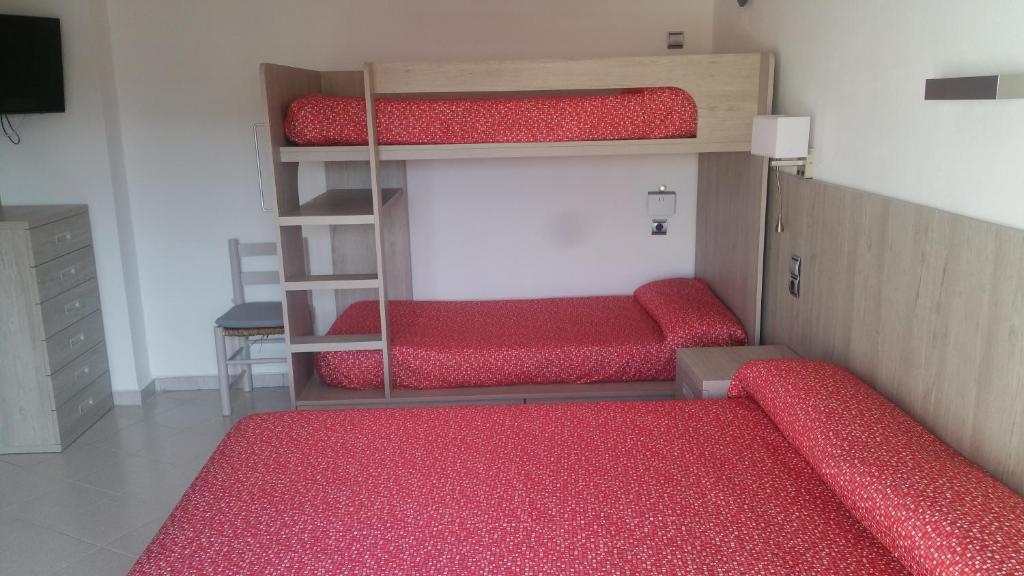 Postel nebo postele na pokoji v ubytování Hotel Can Català