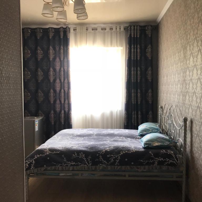 Postel nebo postele na pokoji v ubytování Asem Guest House