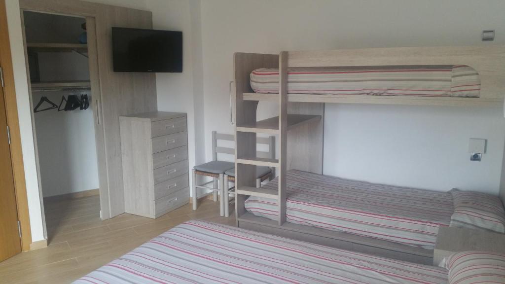 Postel nebo postele na pokoji v ubytování Hotel Can Català