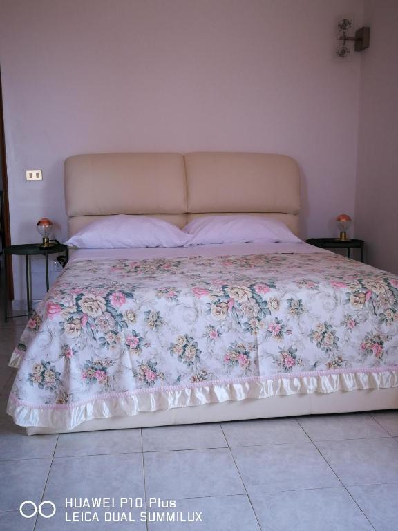 Posteľ alebo postele v izbe v ubytovaní Villa Galilei Rooms