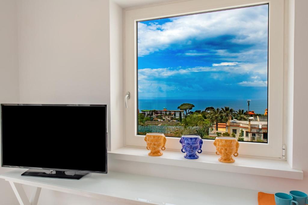 TV a/nebo společenská místnost v ubytování 3 Suites View
