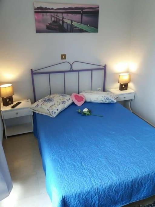 Posteľ alebo postele v izbe v ubytovaní Apartment Adriana