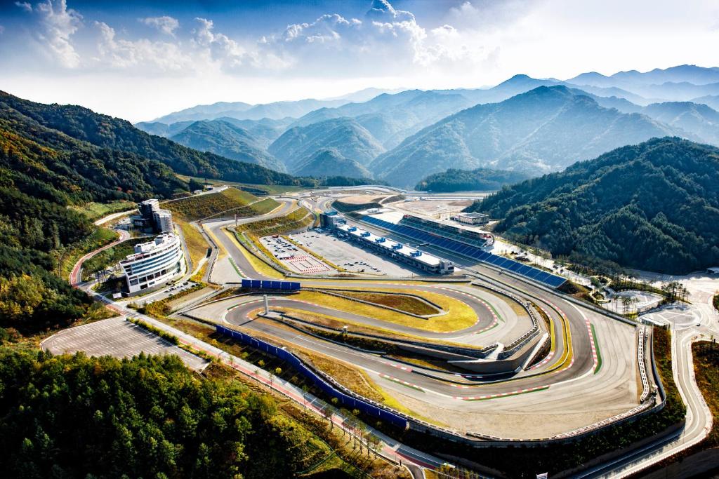 an aerial view of a race track in the mountains at Inje Speedium Hotel & Resort in Inje