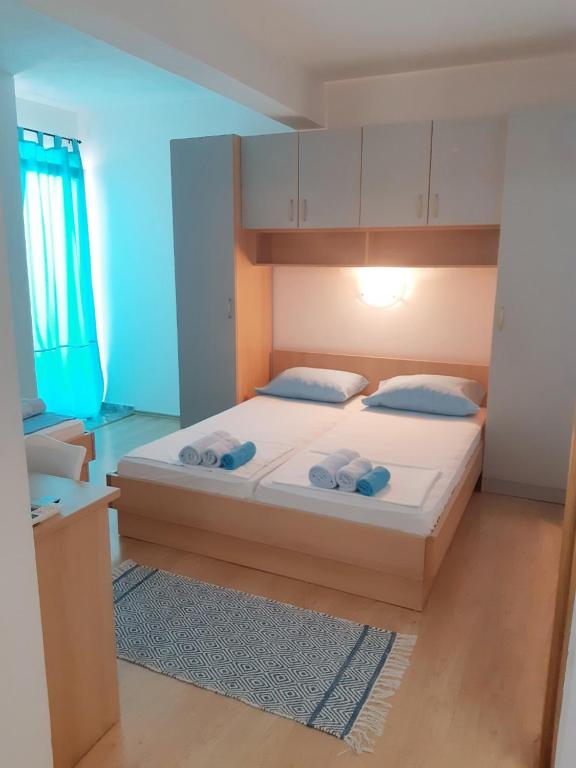 Postel nebo postele na pokoji v ubytování Villa Star