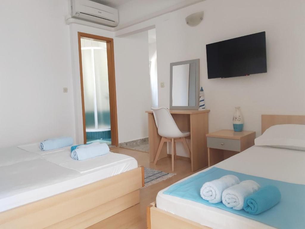 Postel nebo postele na pokoji v ubytování Villa Star