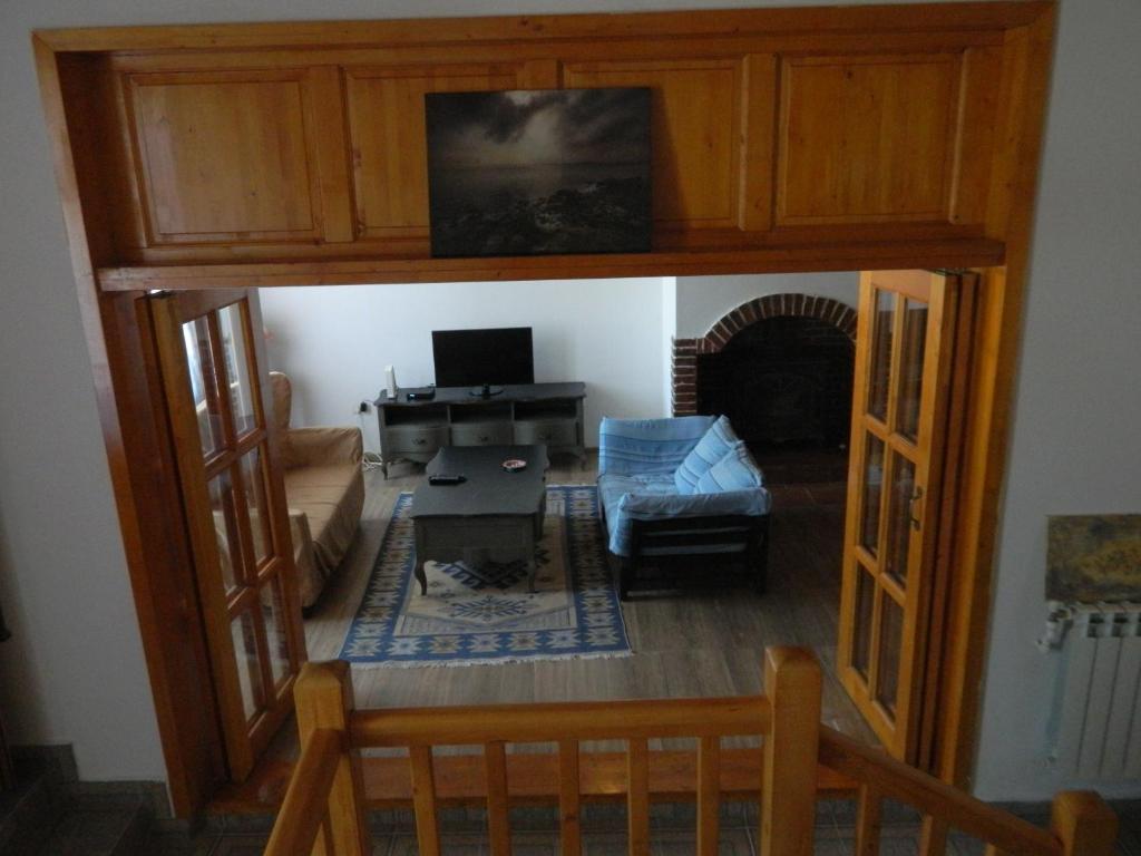 TV a/nebo společenská místnost v ubytování Casa Ligia