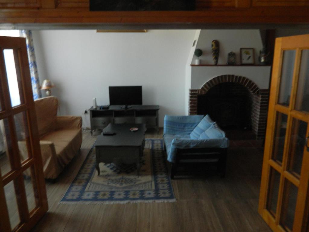 TV a/nebo společenská místnost v ubytování Casa Ligia