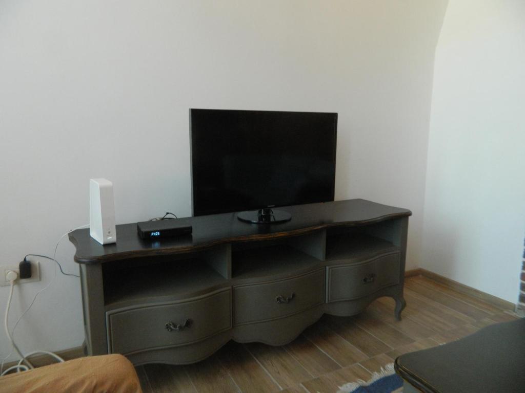TV a/nebo společenská místnost v ubytování Casa Ligia