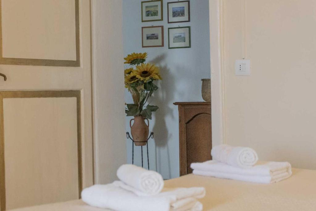 Postel nebo postele na pokoji v ubytování Agriturismo La Ripolina