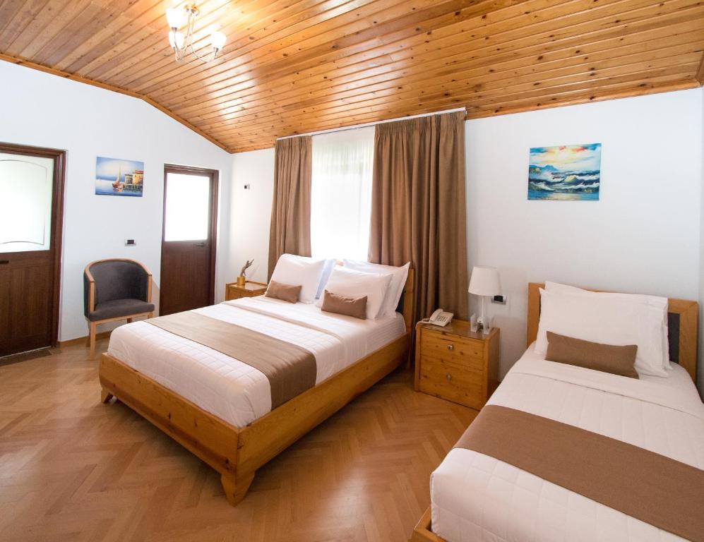 Кровать или кровати в номере Rambuje Resort