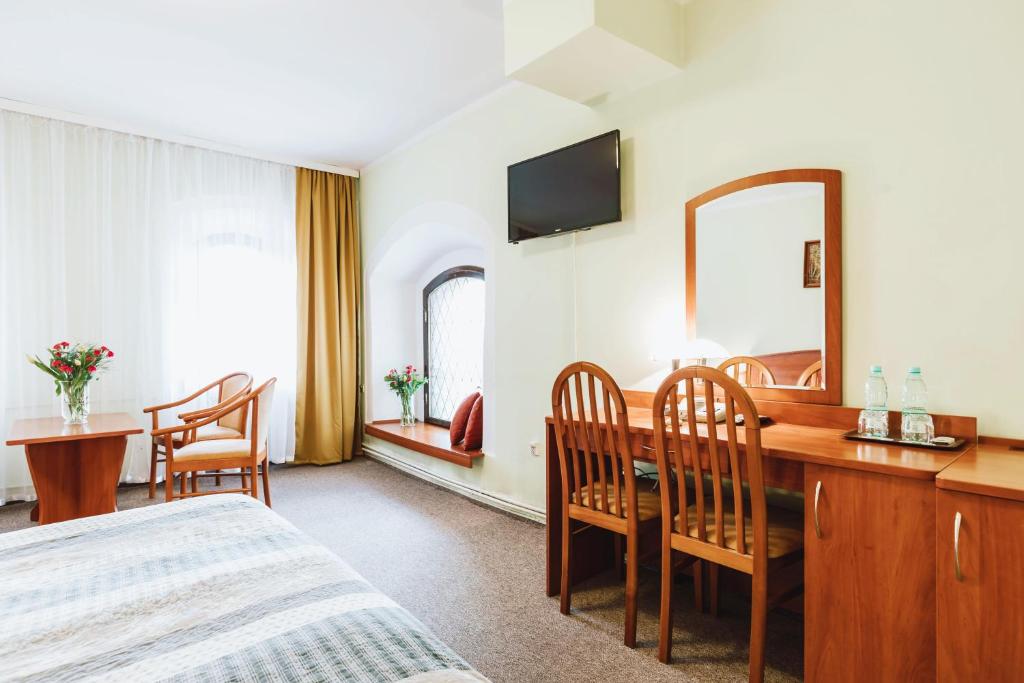 TV a/nebo společenská místnost v ubytování Hotel Gromada Toruń