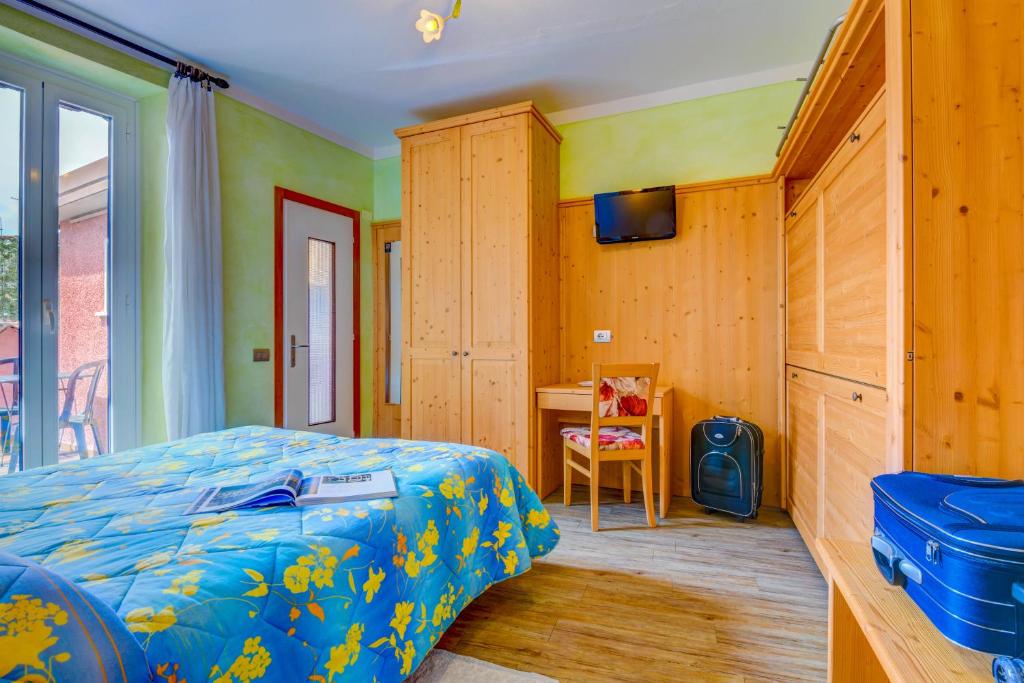 Postel nebo postele na pokoji v ubytování Hotel Castello