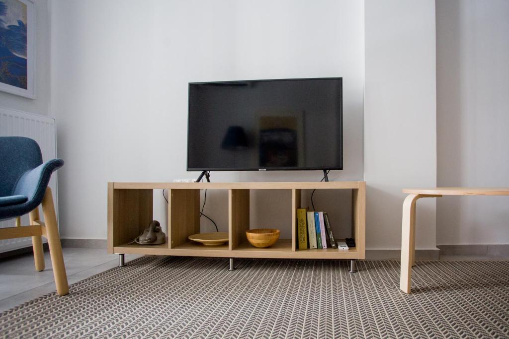 Televízia a/alebo spoločenská miestnosť v ubytovaní Spacious Unique Luxurious Central