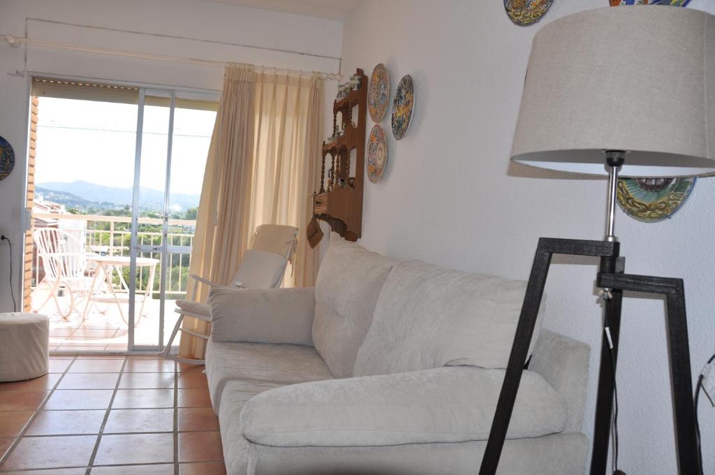 A seating area at Javea Lovely Apartments Facing the Sea