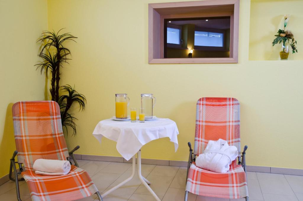 Nápoje v ubytovaní Berghotel Rasis