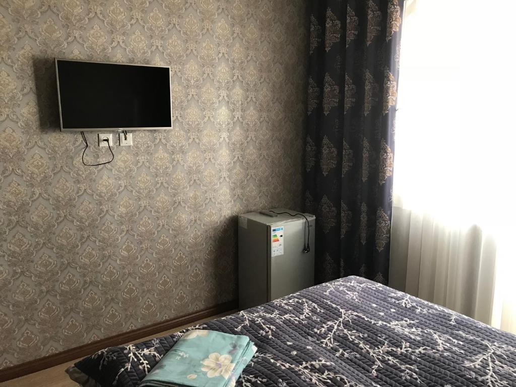 TV a/nebo společenská místnost v ubytování Asem Guest House