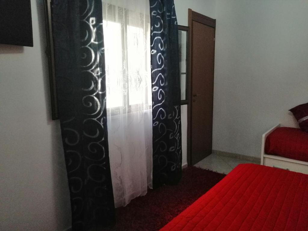 Posteľ alebo postele v izbe v ubytovaní La Terrazza