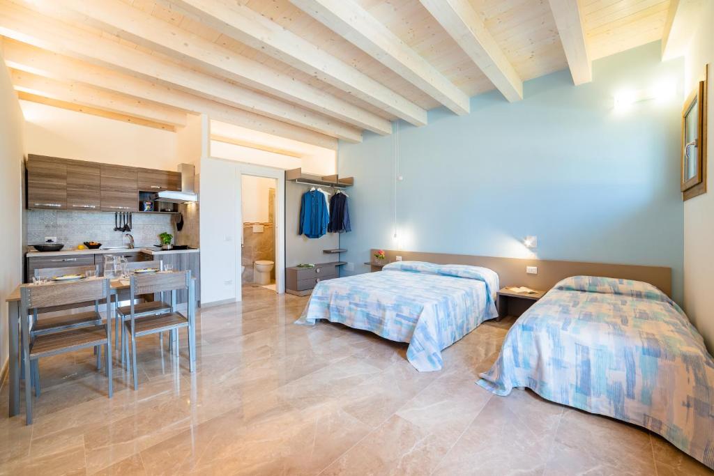 Posteľ alebo postele v izbe v ubytovaní Agriturismo Acquachiara