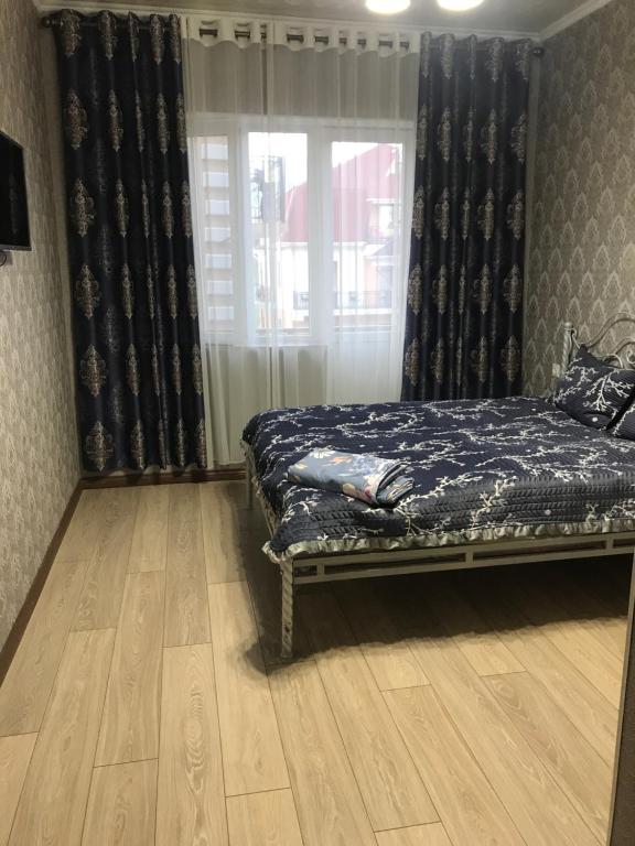 Postel nebo postele na pokoji v ubytování Asem Guest House
