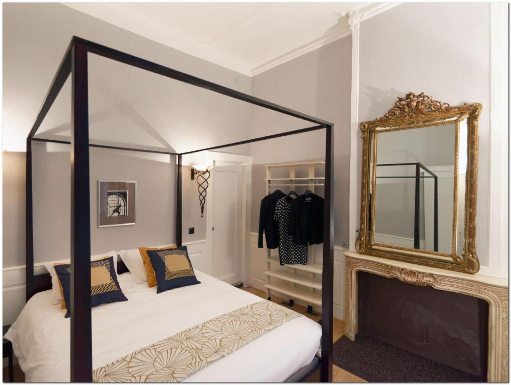 Кровать или кровати в номере Appartement Le 22 - Colmar Centre Parking Privatif en option