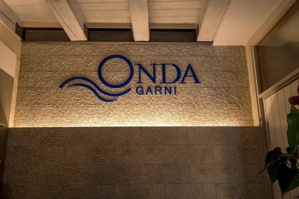 Certifikát, hodnocení, plakát nebo jiný dokument vystavený v ubytování Garni Onda