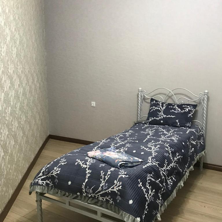 Postel nebo postele na pokoji v ubytování Asem Guest House