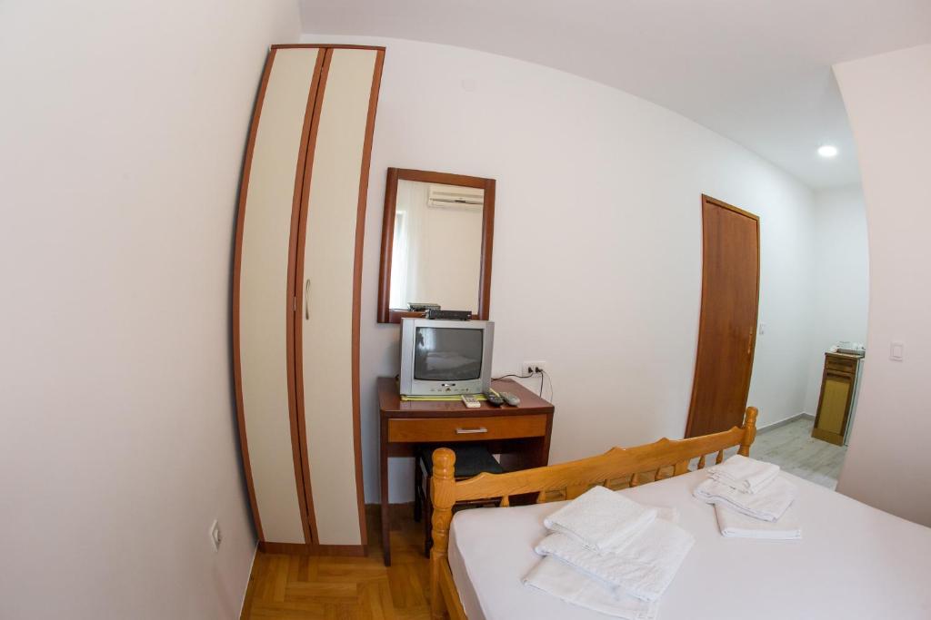 Ένα ή περισσότερα κρεβάτια σε δωμάτιο στο Guesthouse Dapcevic