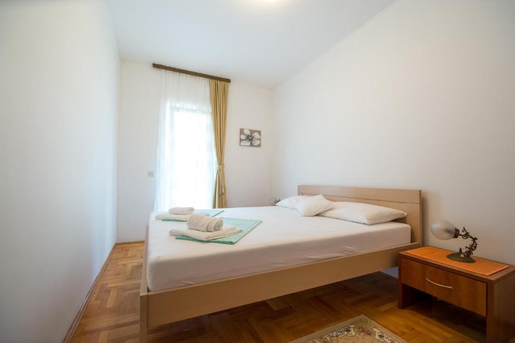 Ένα ή περισσότερα κρεβάτια σε δωμάτιο στο Guesthouse Dapcevic