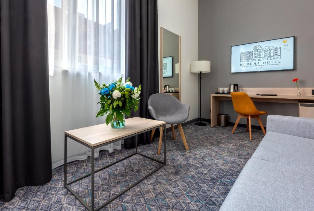 TV a/nebo společenská místnost v ubytování Korona Gold - Korona Hotel Wrocław
