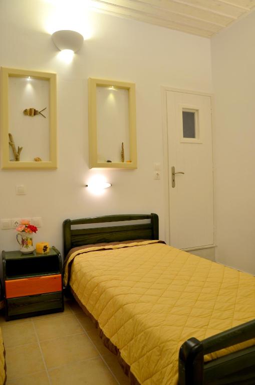 Postel nebo postele na pokoji v ubytování Galaxy Hotel