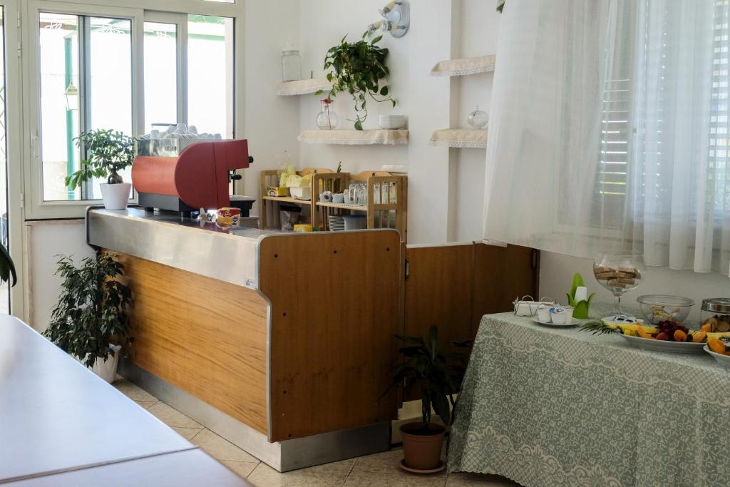 Příslušenství pro přípravu čaje a kávy v ubytování Hotel Porto Badisco