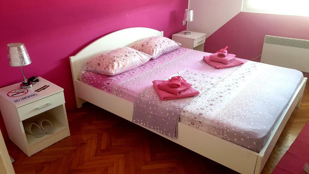 Krevet ili kreveti u jedinici u okviru objekta Apartment Centar Deluxe