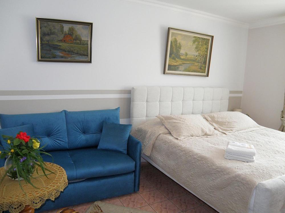 Postel nebo postele na pokoji v ubytování Villa Leon Hel
