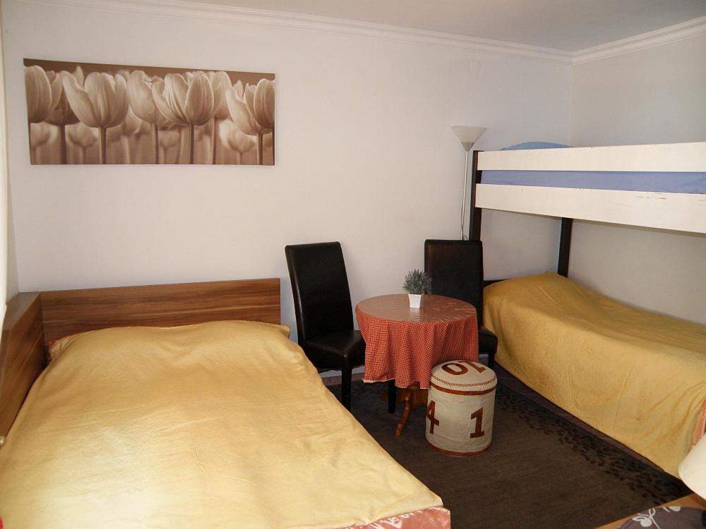 Postel nebo postele na pokoji v ubytování Villa Leon Hel