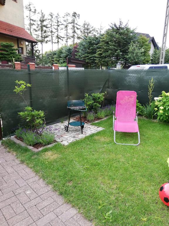 Vonkajšia záhrada v ubytovaní Apartament Słoneczny