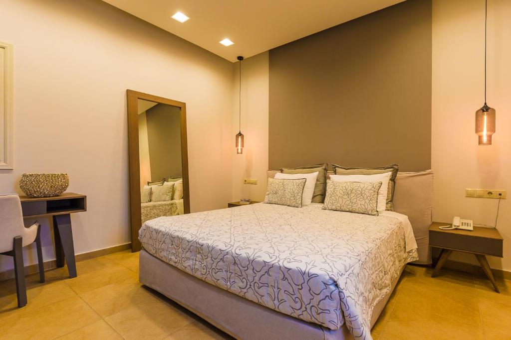Postel nebo postele na pokoji v ubytování Anassa Deluxe Suites