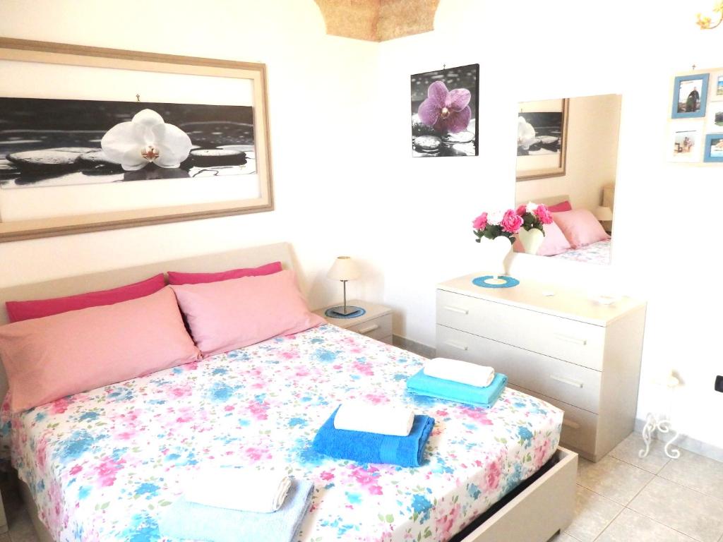 Postel nebo postele na pokoji v ubytování Casa Terrazzata in centro