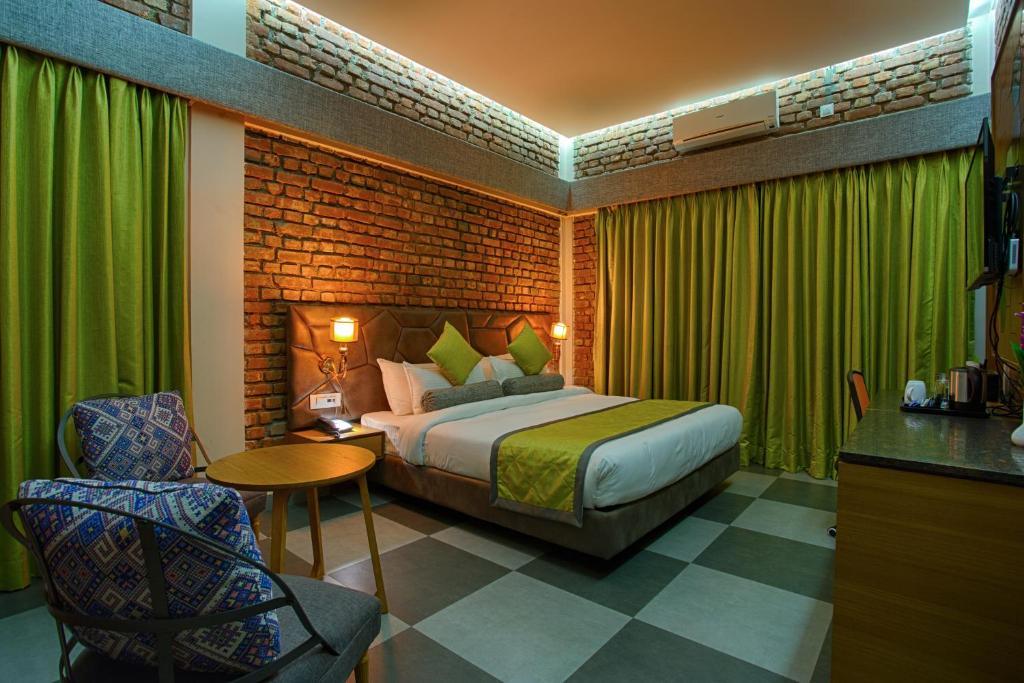 Postel nebo postele na pokoji v ubytování Four Vedas Hotel & Resort