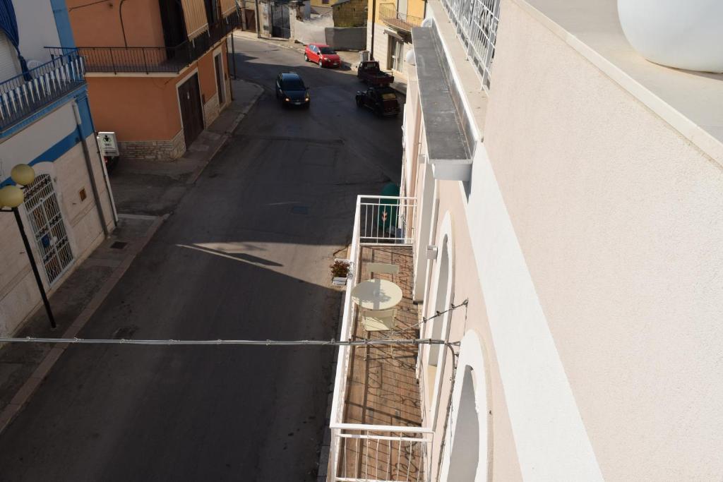 A balcony or terrace at DomuS al Corso B&B