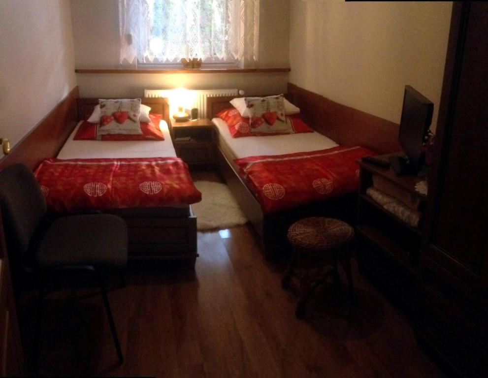 Łóżko lub łóżka w pokoju w obiekcie Apartament Zuzia