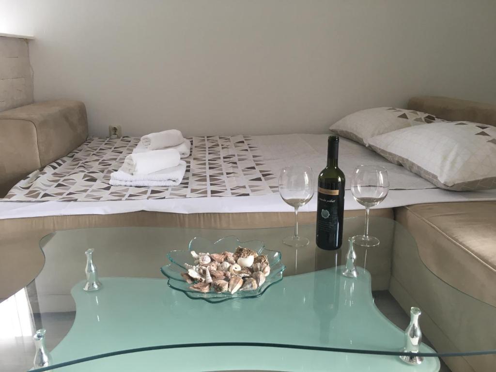 Łóżko lub łóżka w pokoju w obiekcie Apartment Sandrina