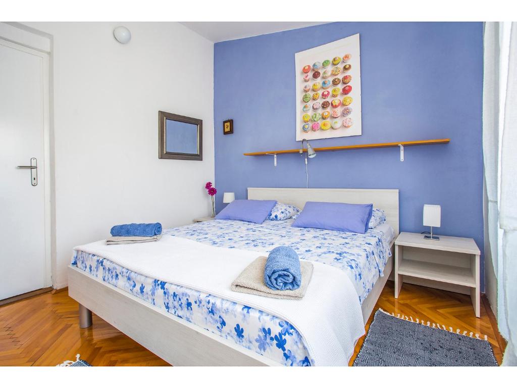 Ένα ή περισσότερα κρεβάτια σε δωμάτιο στο Apartment Bartul