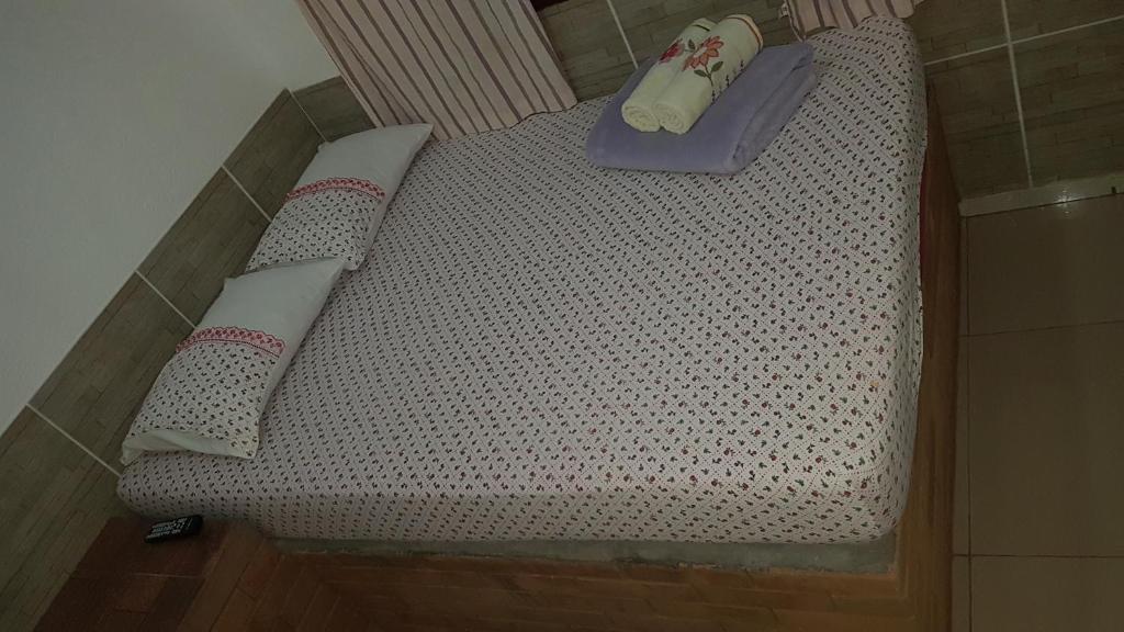 Postel nebo postele na pokoji v ubytování Pouso